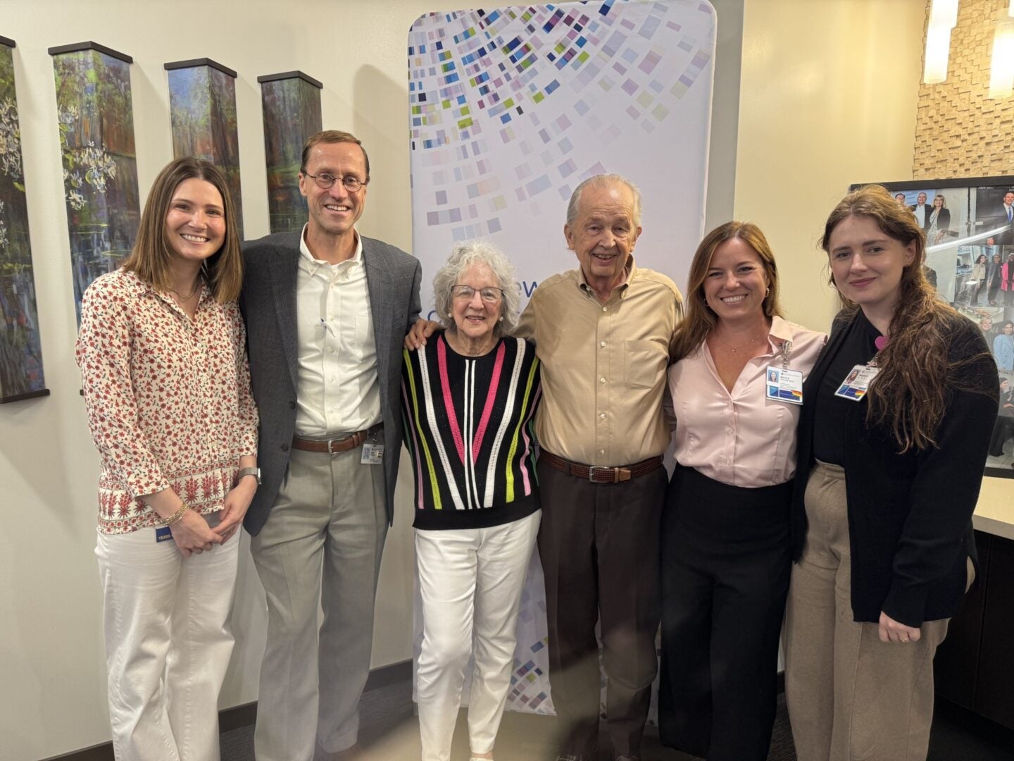 Photo of Myra and Darwin Smith with Baylor Scott & White Dallas employees