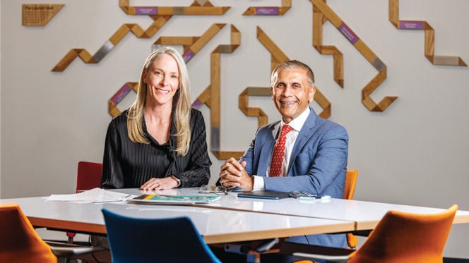 Photo of Ashley Arnold and Dr. Javed Butler at Baylor Scott & White Health