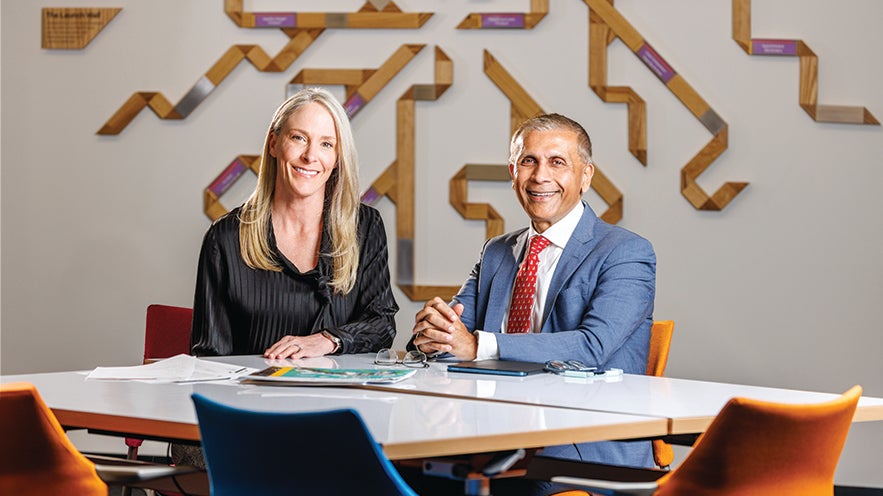 Photo of Ashley Arnold and Dr. Javed Butler at Baylor Scott & White Health