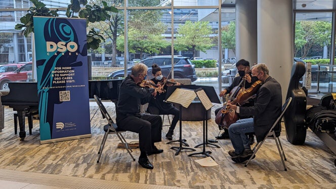 Photo of Dallas Symphony Orchestra members performing at Sammons Cancer Center Baylor Scott & White Arts in Medicine Program