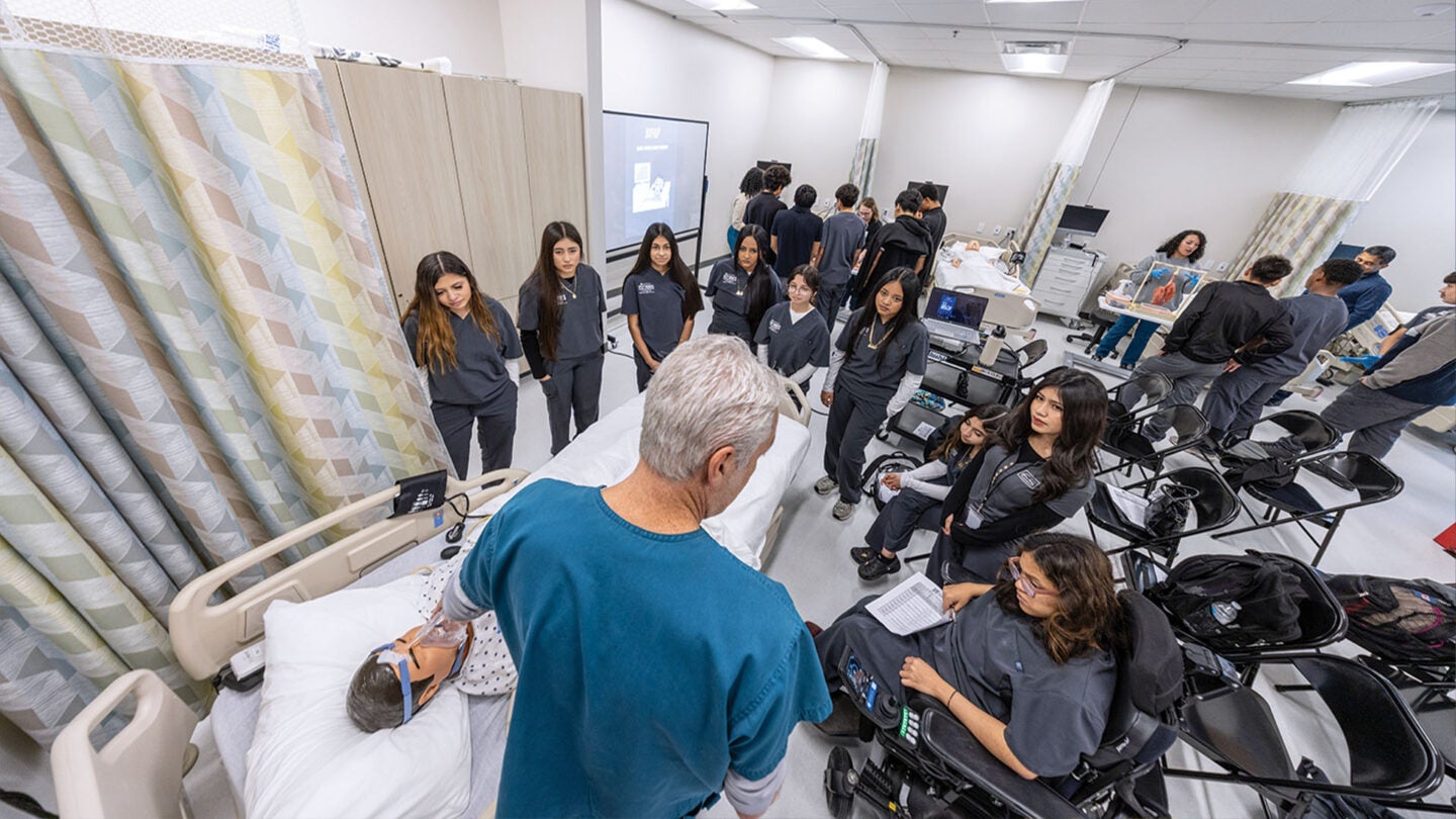 Photo showing Baylor Scott & White clinicians teaching students at Uplift Heights